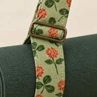 Clover Mat Carry Strap, close-up of the print and stitching